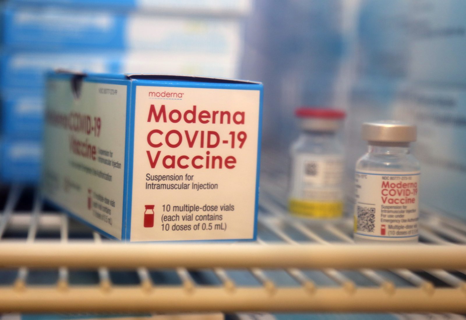 Naval Health Clinic Lemoore staff preparing Moderna COVID-19 vaccine doses for administration