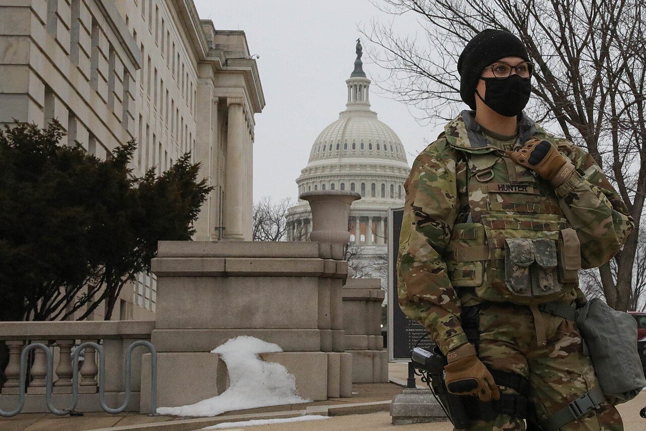 An Army National Guard military police soldier stands guard near the U.S. Capitol in Washington, D.C.
