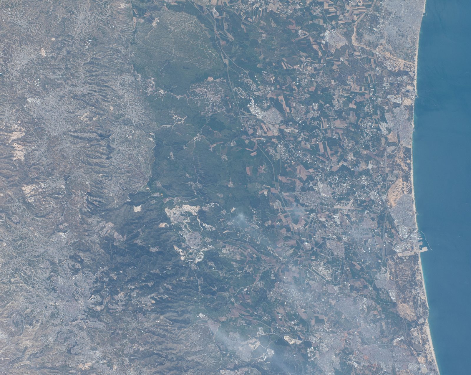 ISS satellite view of the Mediterranean Sea coastline showing the Gaza Strip, Ashdod, and surrounding region from space