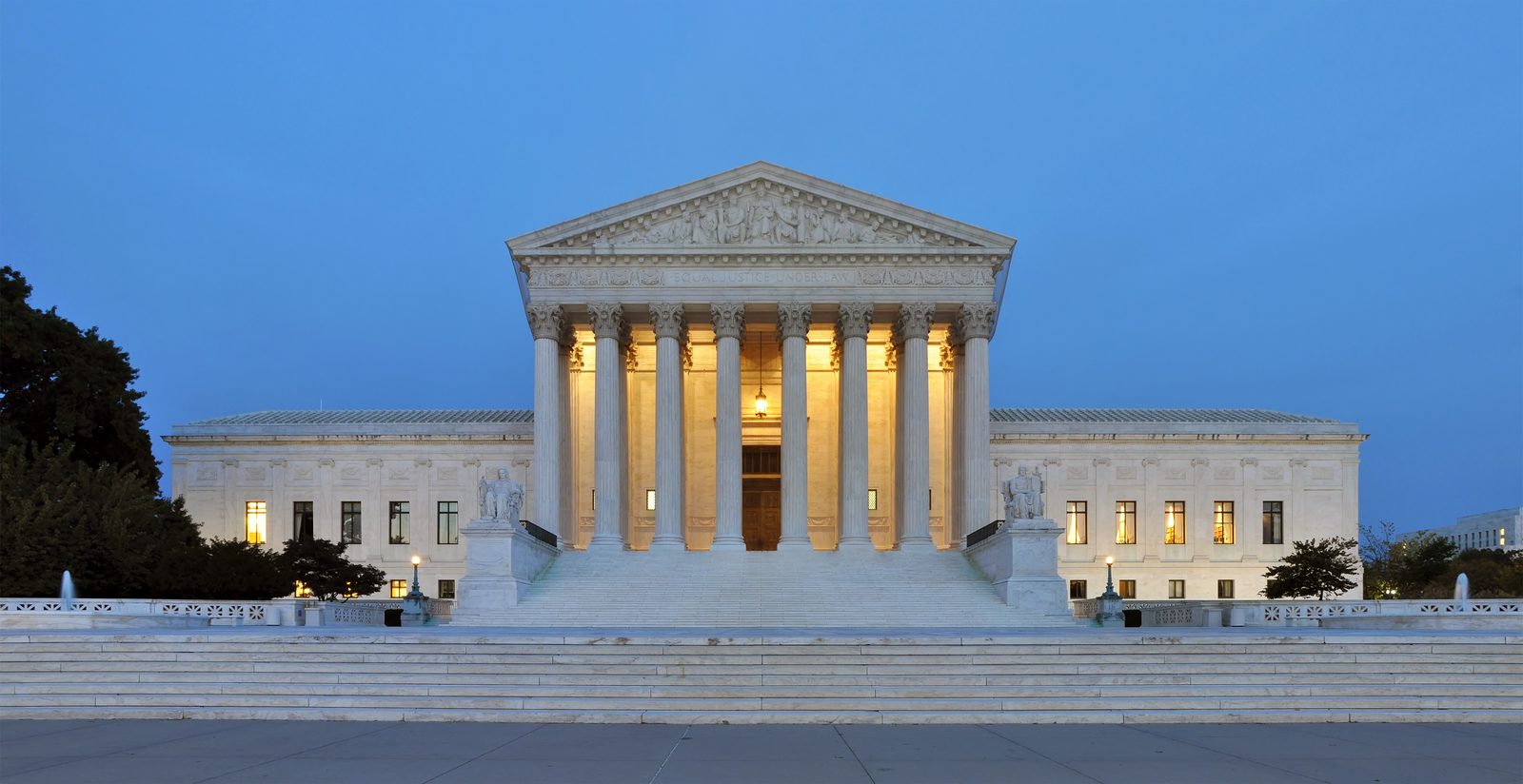 West facade of the United States Supreme Court Building at dusk in Washington DC