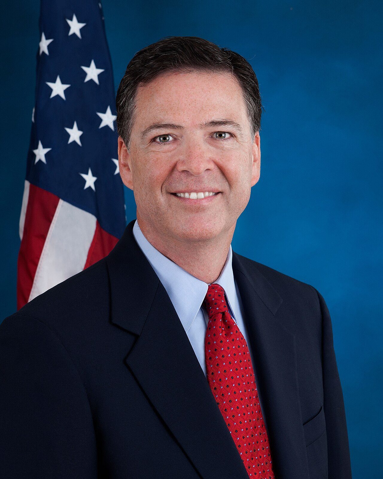 Official FBI portrait of former Director James Comey, among the Trump foes indicted.